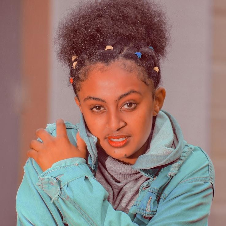 Portrait of Nova, group coordinator and fusion cooking expert